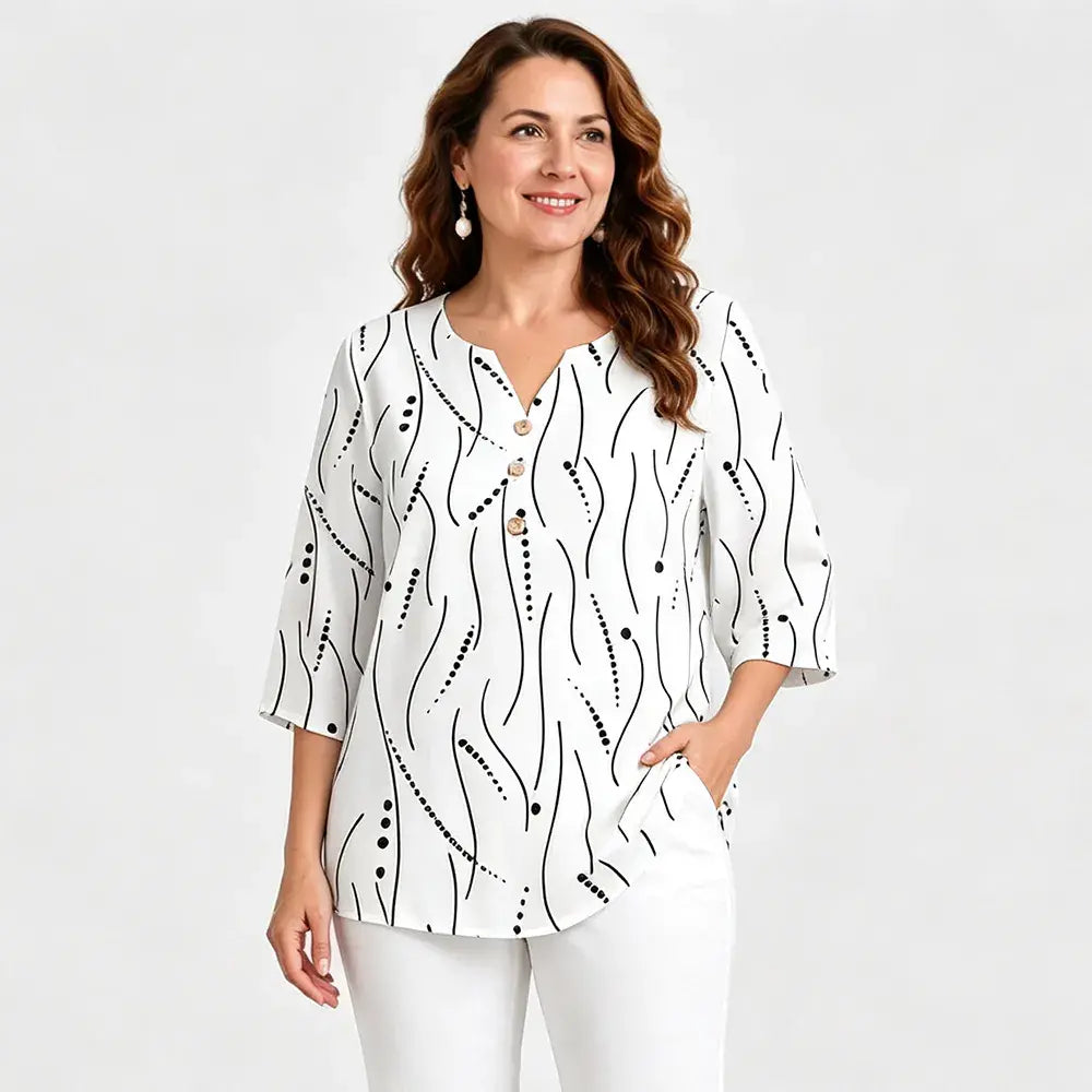 Blusa estampada de cuello en V y talla grande: corte holgado, manga corta y diseño floral; una blusa ligera para mujer con efecto reductor en la cintura.