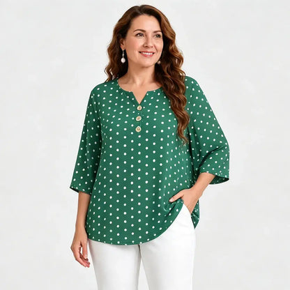 Blusa estampada de cuello en V y talla grande: corte holgado, manga corta y diseño floral; una blusa ligera para mujer con efecto reductor en la cintura.